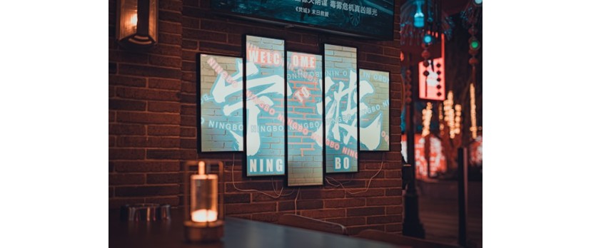 How Glowing Poster Designs Turn Nighttime Streets into Storytelling Spaces